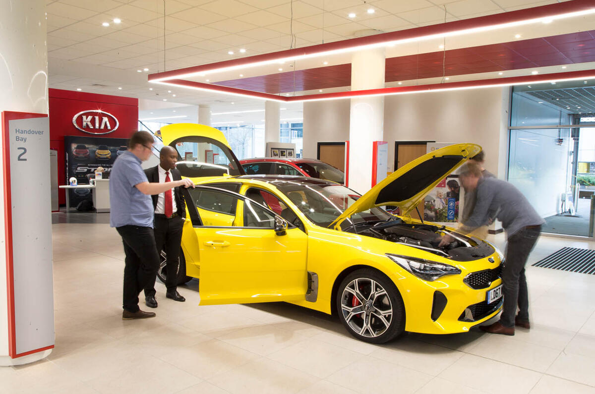 Kia Stinger GT S long-term review keys handover