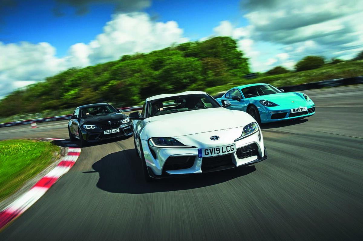 Clash Of The Coupes Toyota Supra Meets Bmw M2 Competition And Porsche 718 Cayman Autocar