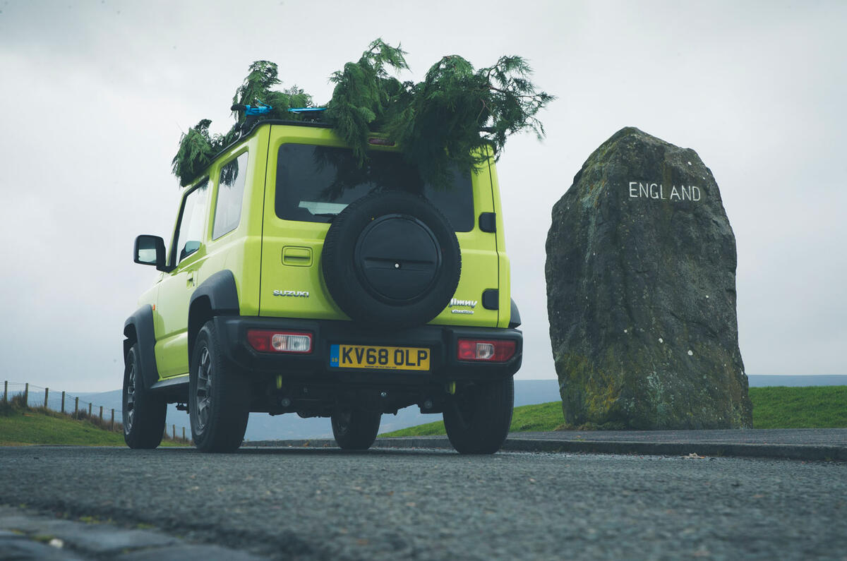 Christmas tree road trip in a Suzuki Jimny
