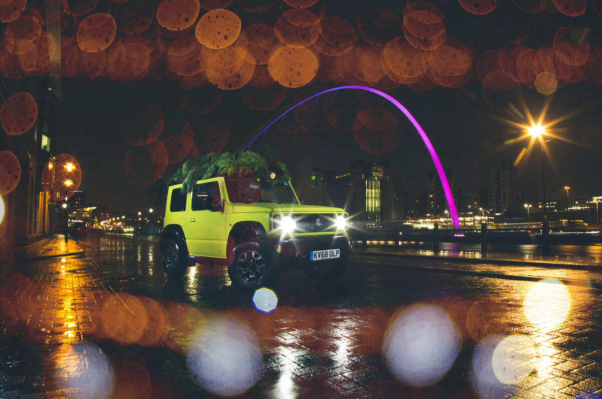 Christmas tree road trip in a Suzuki Jimny