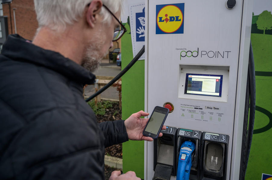 Man using Lidl electric car charger 2021