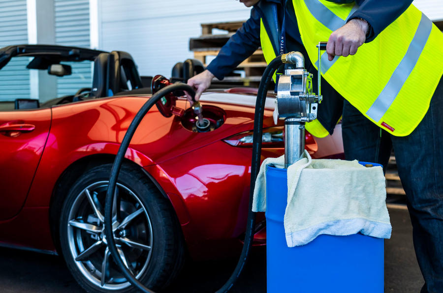 Mazda MX5 being filled with sustainable fuel