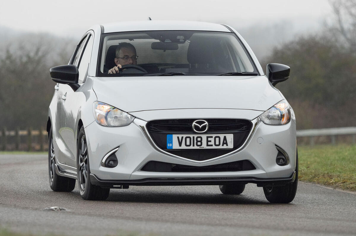 Mazda 2 Sport Black on the road