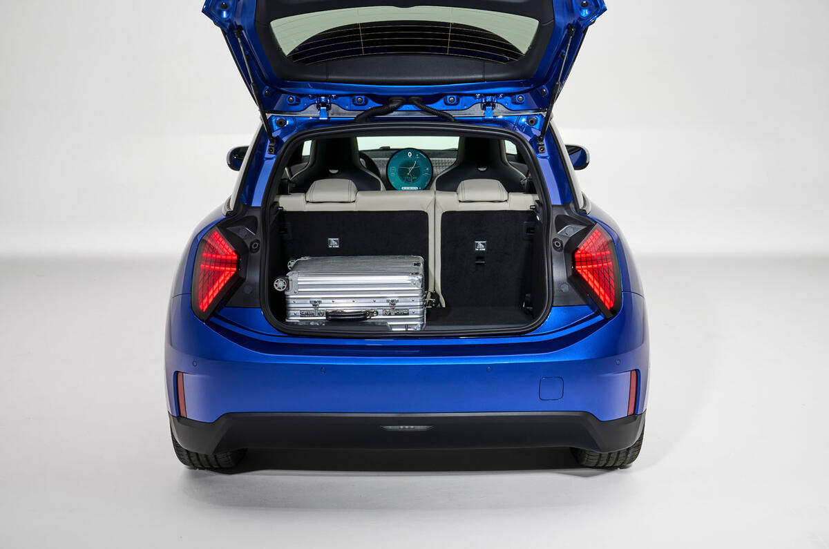 Mini Cooper Electric boot with suitcase