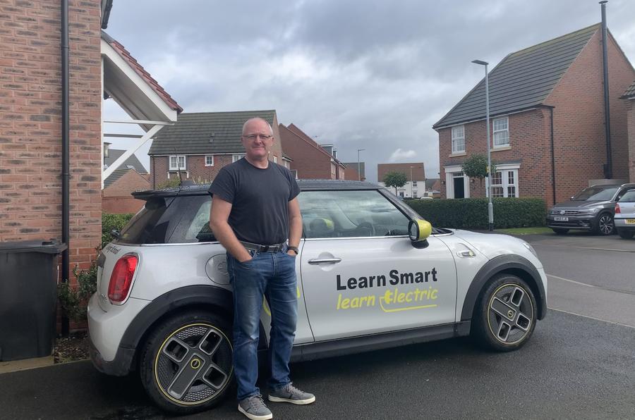 Mike Nunn teaches pupils in a Mini E, having first bought a Renault Zoe