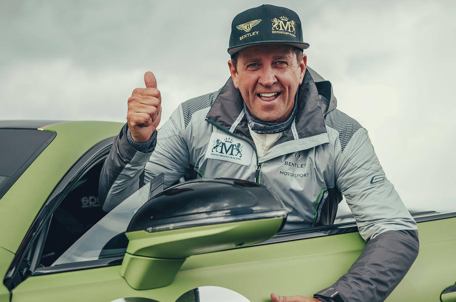 rhys millen celebrates breaking pikes peak hill climb production car record in continental gt