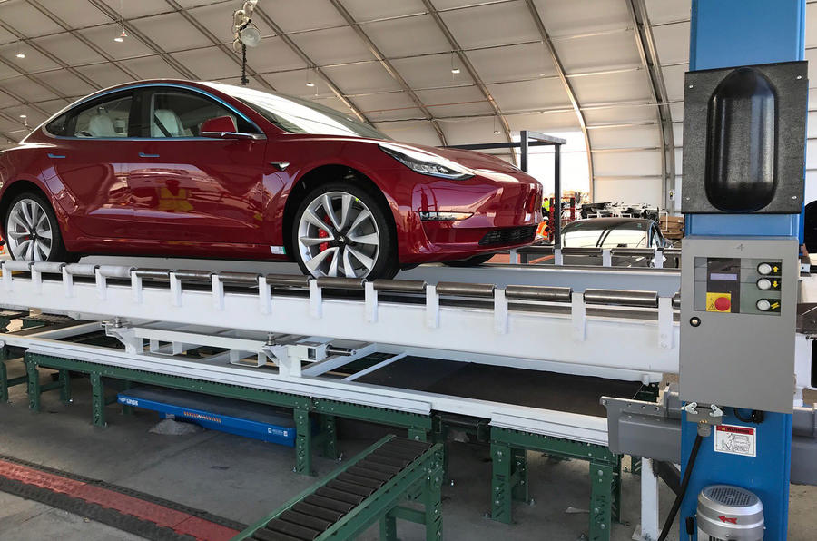 First Tesla Model 3 Dual Motor produced on temporary production line
