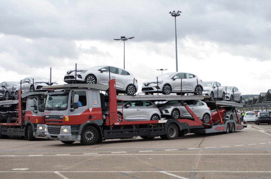 Transporter at factory loaded with Renault Clio cars
