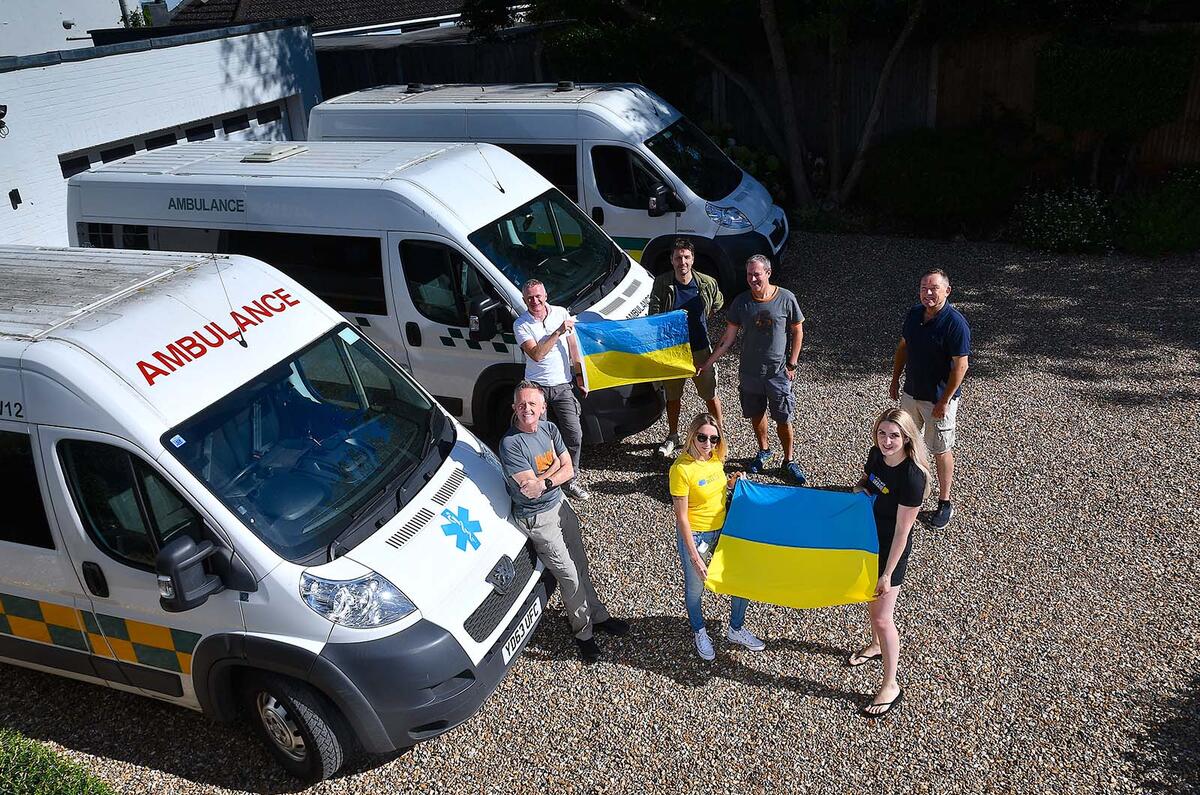Ukraine ambulance feature volunteers with Ukraine flag