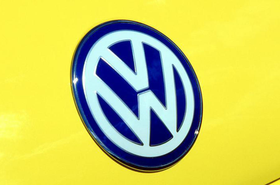 VW loss profits emissions
