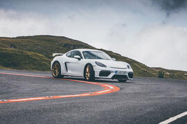 Porsche 718 Cayman GT4 driving - front