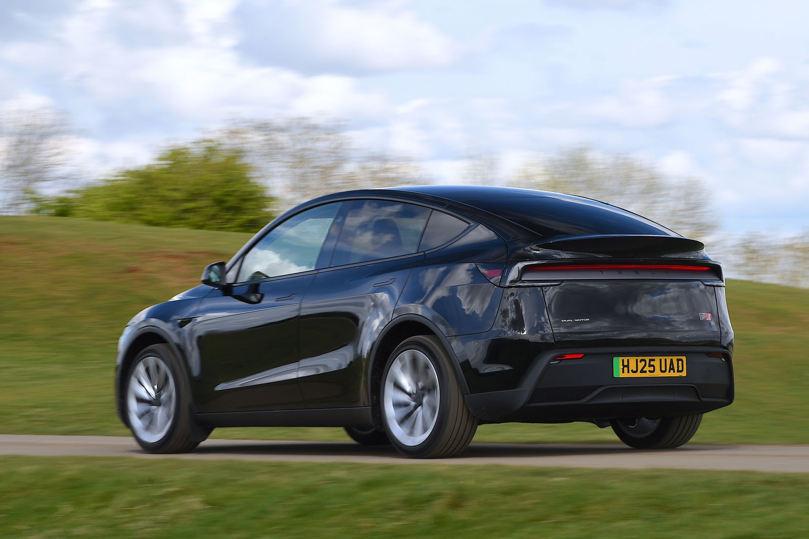 Tesla Model Y 2025 Review rear action blur 9293